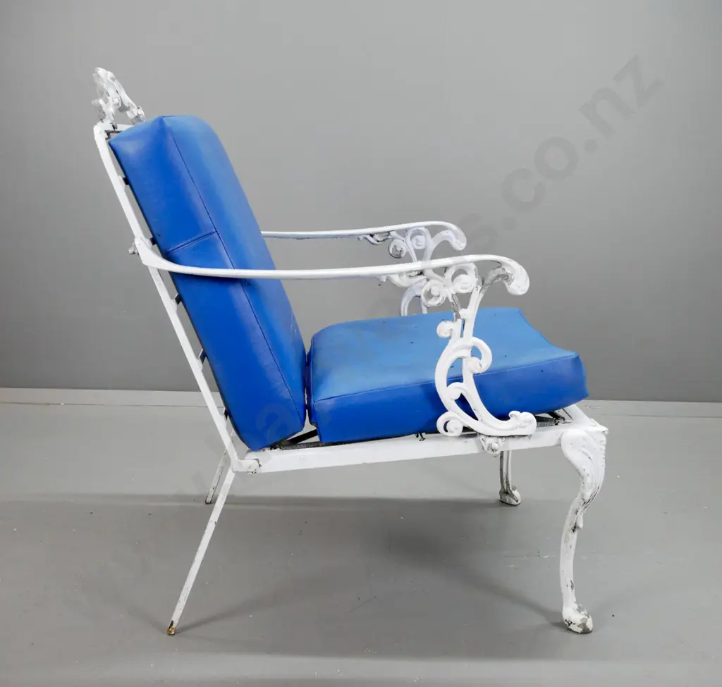 pair of cast alloy white painted patio lounge chairs with blue vinyl squabs - aging and discolouration to vinyl, arms Image 1++