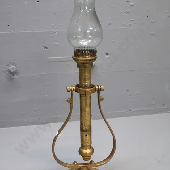 brass ship's candle lantern with gimbal mount, glass chimney with a chunk missing. H-250 W-240 at wall bracket. Has some