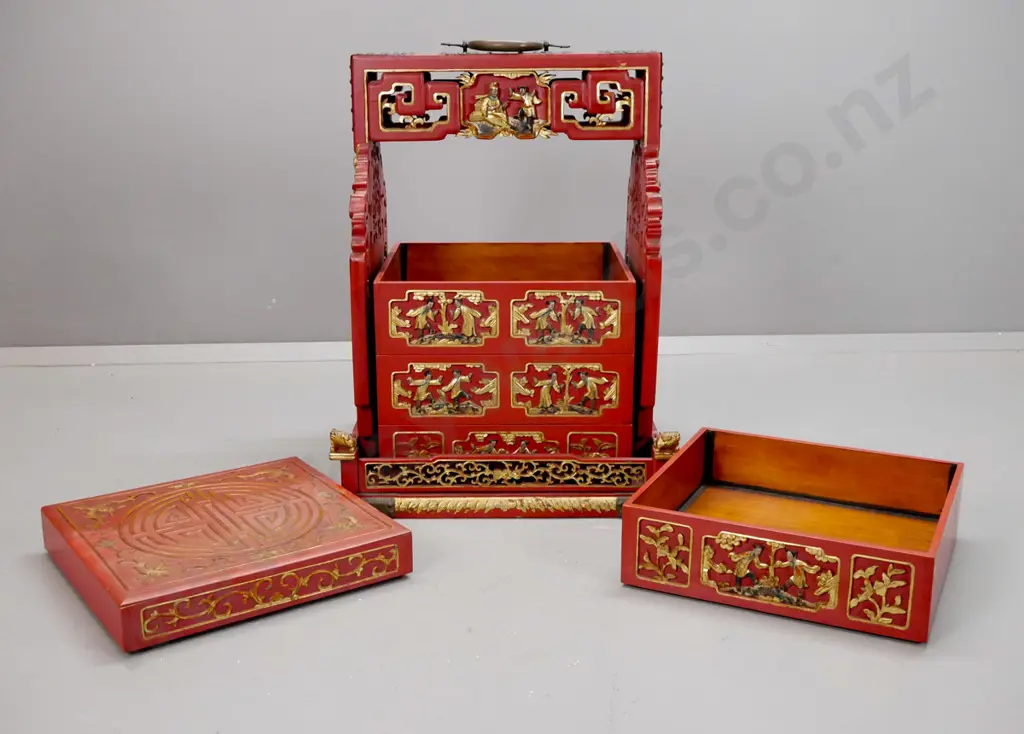 Chinese red lacquered wedding / food storage chest with carved, pierced and gilded decoration, metal binding and top Image 1++