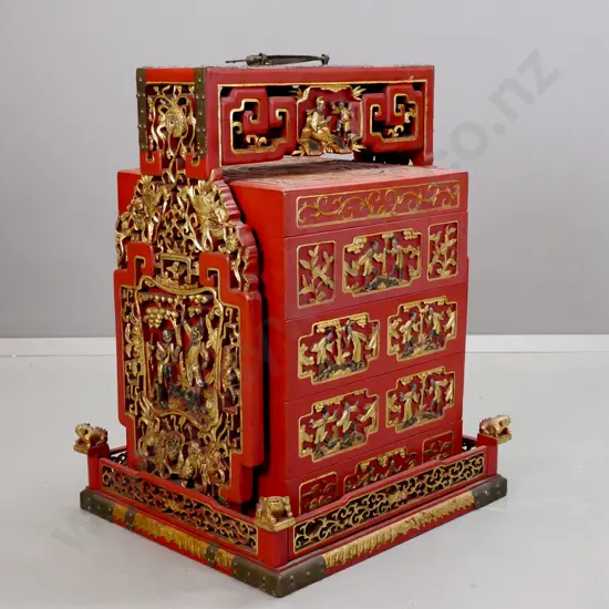 Chinese red lacquered wedding / food storage chest with carved, pierced and gilded decoration, metal binding and top
