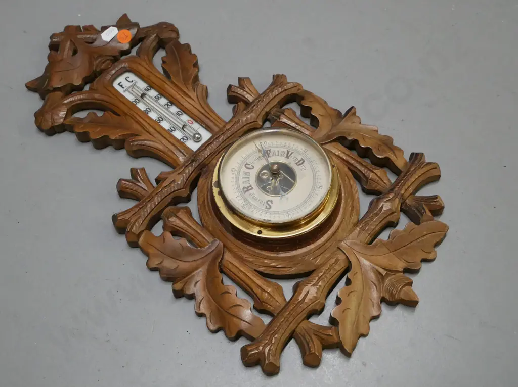 wall-hanging barometer & mercury-filled thermometer, carved walnut Black Forest style. Marked Made in Germany. Image 1++