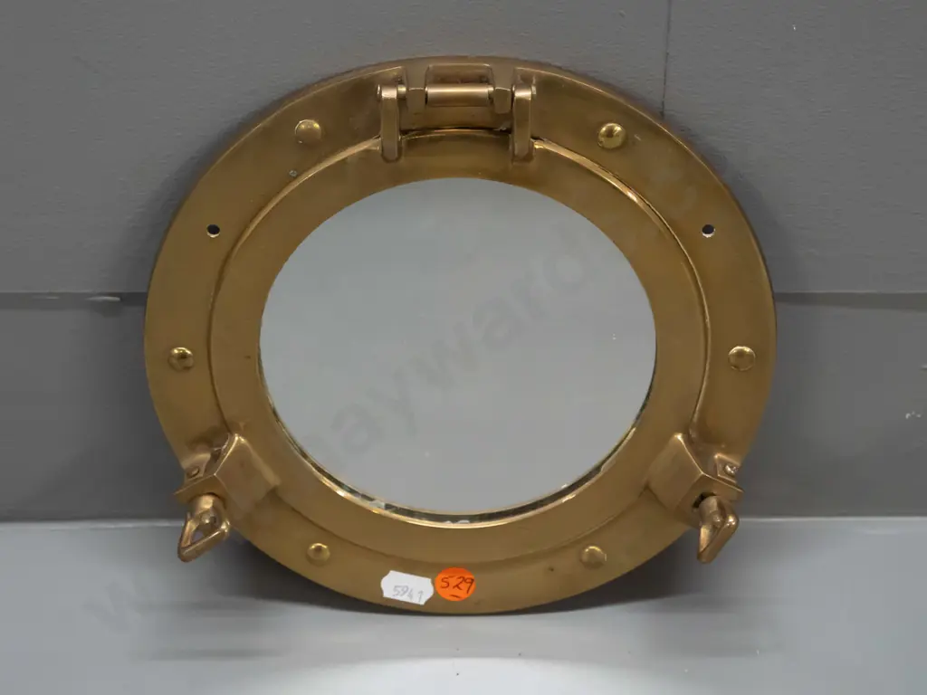 small brass porthole style wall mirror with thumb screw closures - minor discolouration D-210 Image 1++