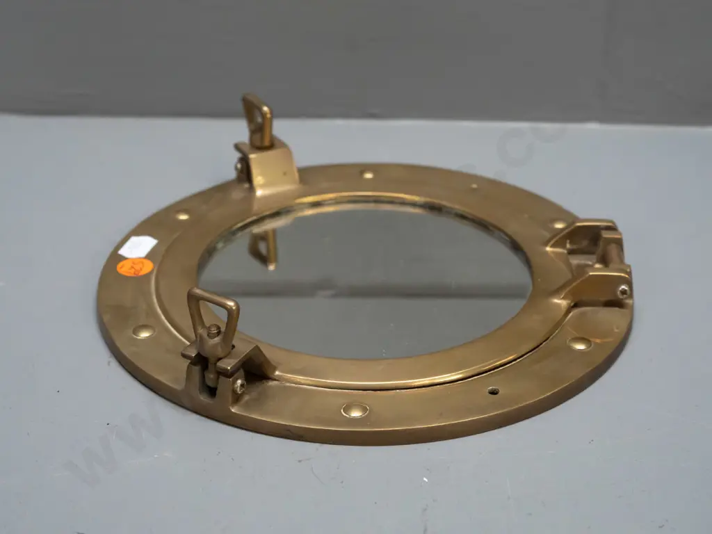 small brass porthole style wall mirror with thumb screw closures - minor discolouration D-210 Image 1++