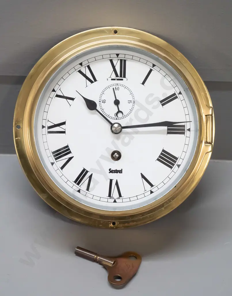 Sestrel brass-cased maritime style clock with winding key - marked British Made on face, some discolouration and Image 1++