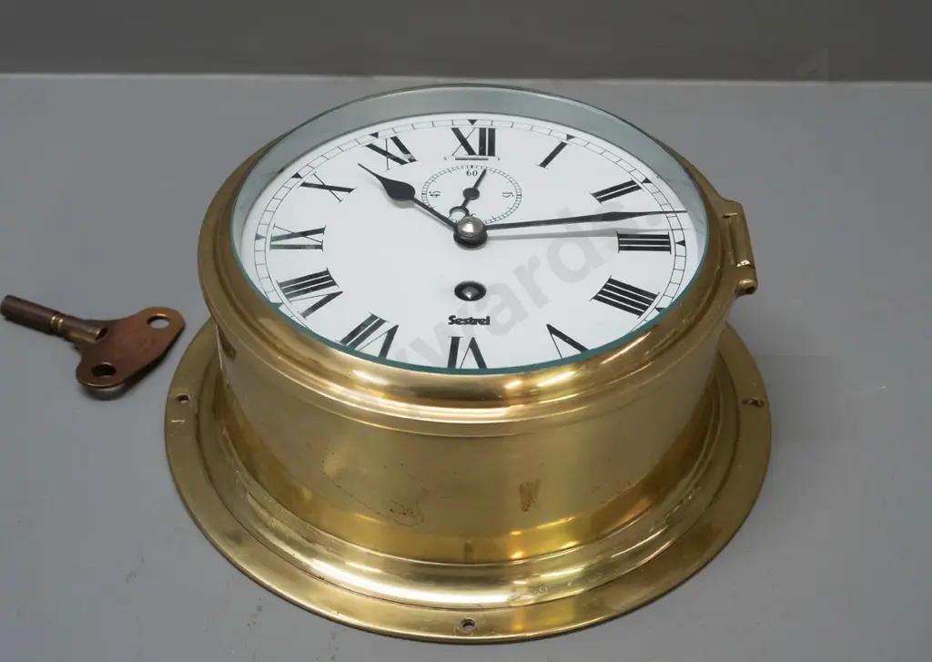 Sestrel brass-cased maritime style clock with winding key - marked British Made on face, some discolouration and Image 1++
