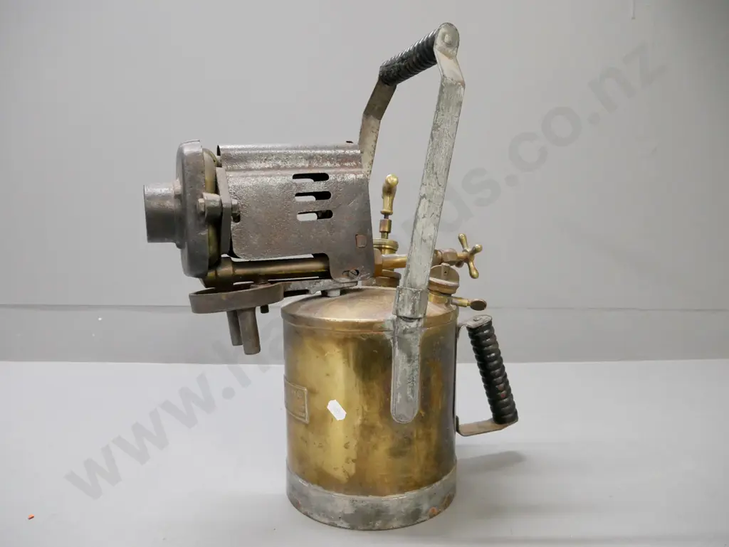vintage blowtorch. W Parkinson & Co London & Birmingham. Varying brass taps and gauge. Cast handle and nozzle. Image 1++