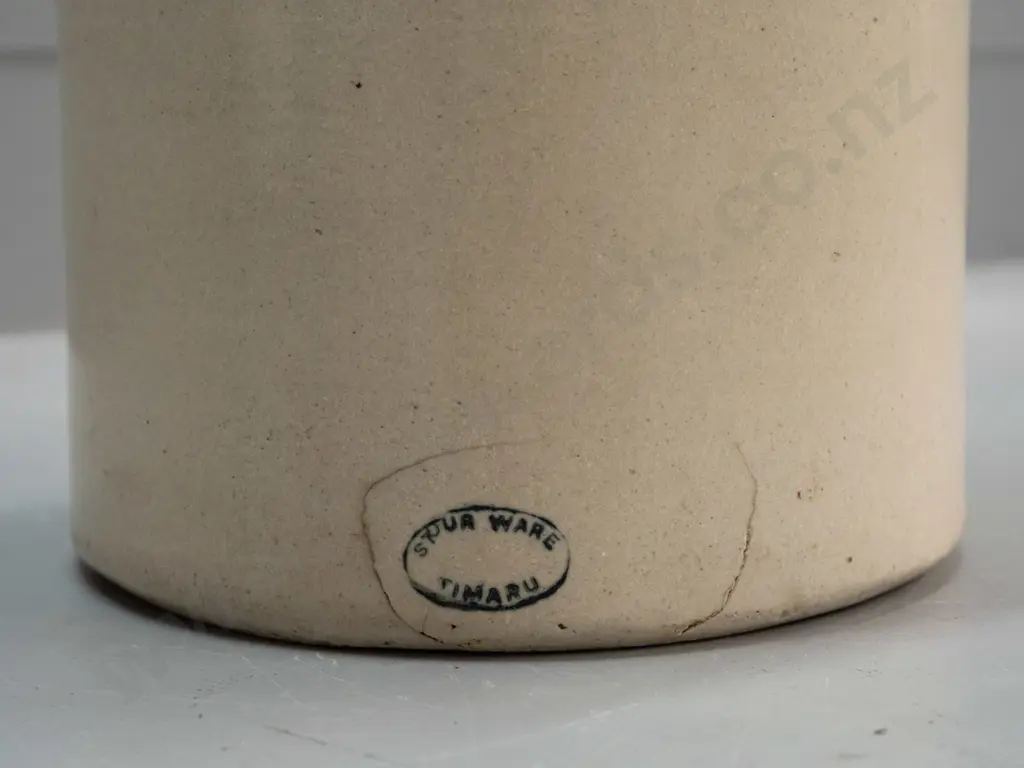 Stour Ware Timaru / West & Co Beverages Dunedin narrow mouth crock with wire handle, no stopper. Has firing crack Image 1++