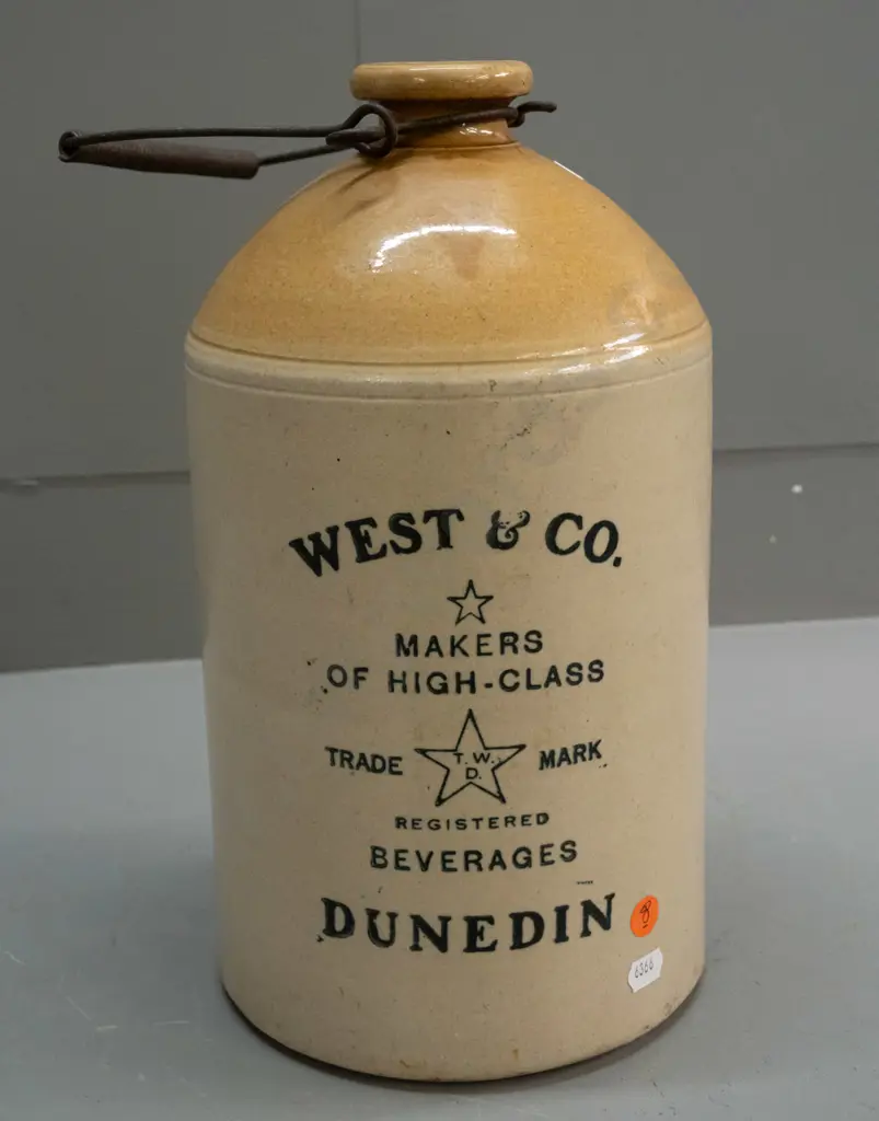 Stour Ware Timaru / West & Co Beverages Dunedin narrow mouth crock with wire handle, no stopper. Has firing crack Image 1++