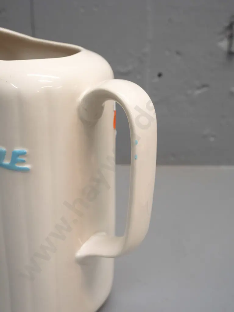 McAlpine refrigerator jug, no maker's marks - small hairline under-glaze flaw and a few spots of blue enamel on handle Image 1++