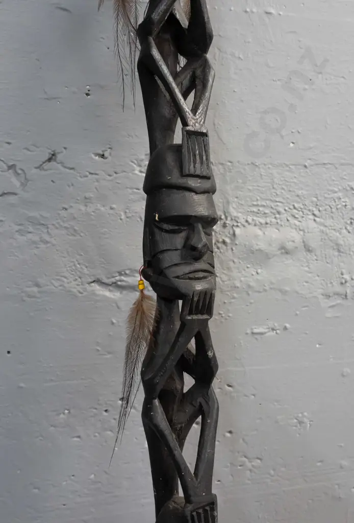 carved timber ceremonial totem or staff with dark stain - 4 heads with feather and bead earrings, unknown origin - wear Image 1++
