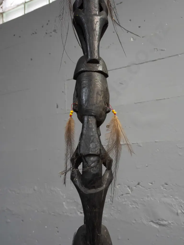 carved timber ceremonial totem or staff with dark stain - 4 heads with feather and bead earrings, unknown origin - wear Image 1++