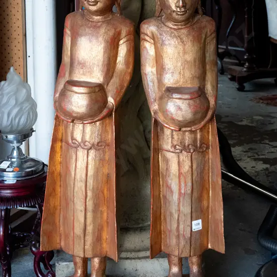 2x large carved wood monk figures - Burmese? - with gilt over red finish H-870, one with crack in base and some bubbling