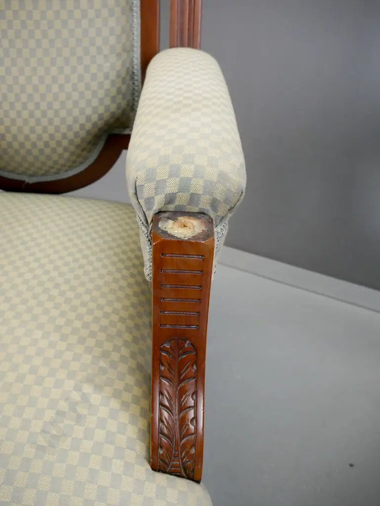 pair of vintage upholstered kauri armchairs with shaped carved back, fluted and foliate carved arms, turned legs - one Image 1++