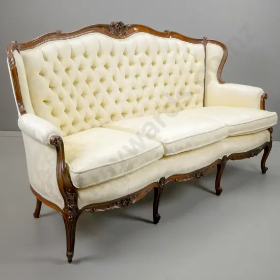 vintage French style walnut settee with shaped and carved back, serpentine front, carved frieze & 4 front cab legs, deep