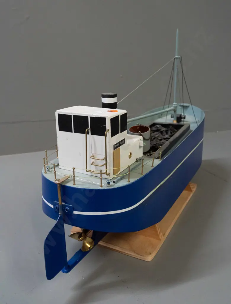 large motorised model boat - marked River Lady, with open coal hold, bucket and crane arm. On stand H-340 L-540 Image 1++