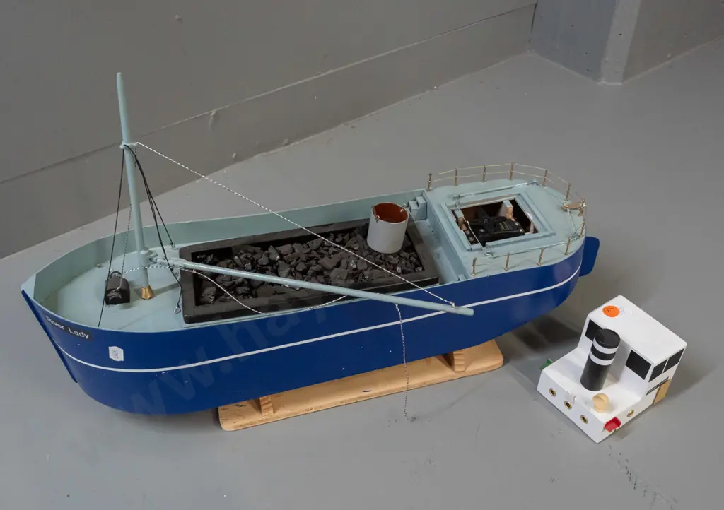 large motorised model boat - marked River Lady, with open coal hold, bucket and crane arm. On stand H-340 L-540 Image 1++