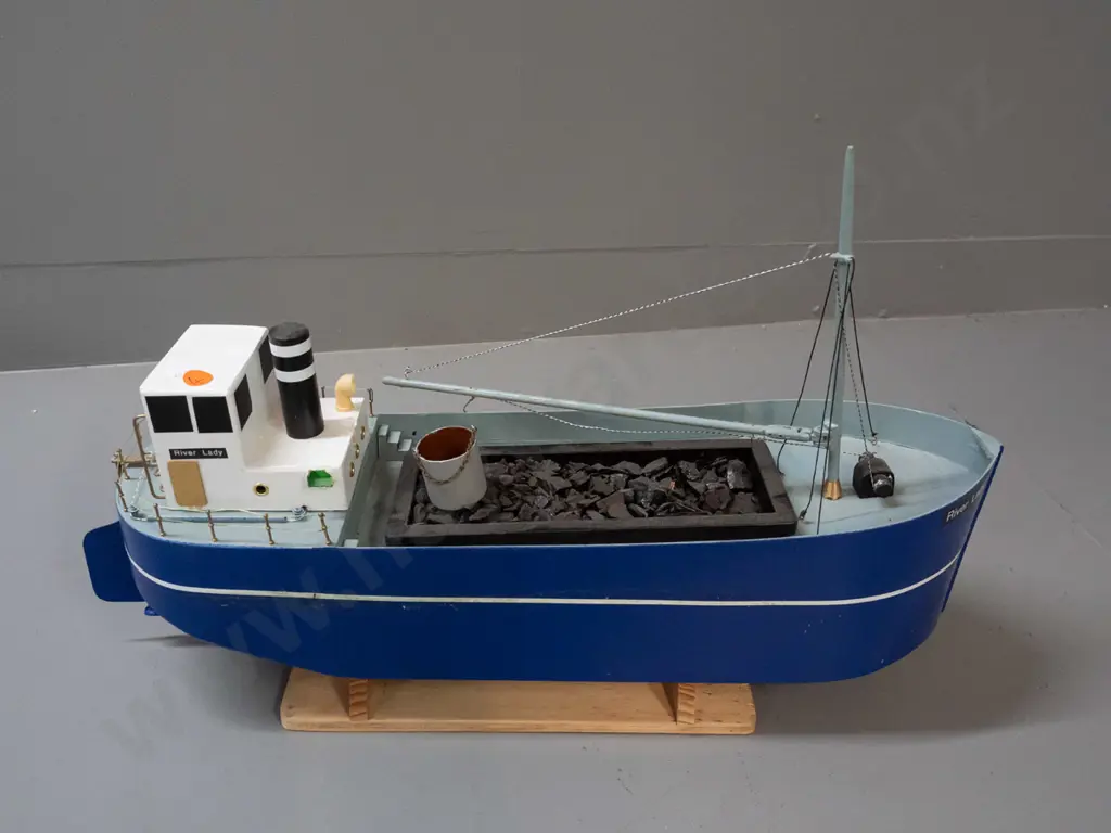 large motorised model boat - marked River Lady, with open coal hold, bucket and crane arm. On stand H-340 L-540 Image 1++