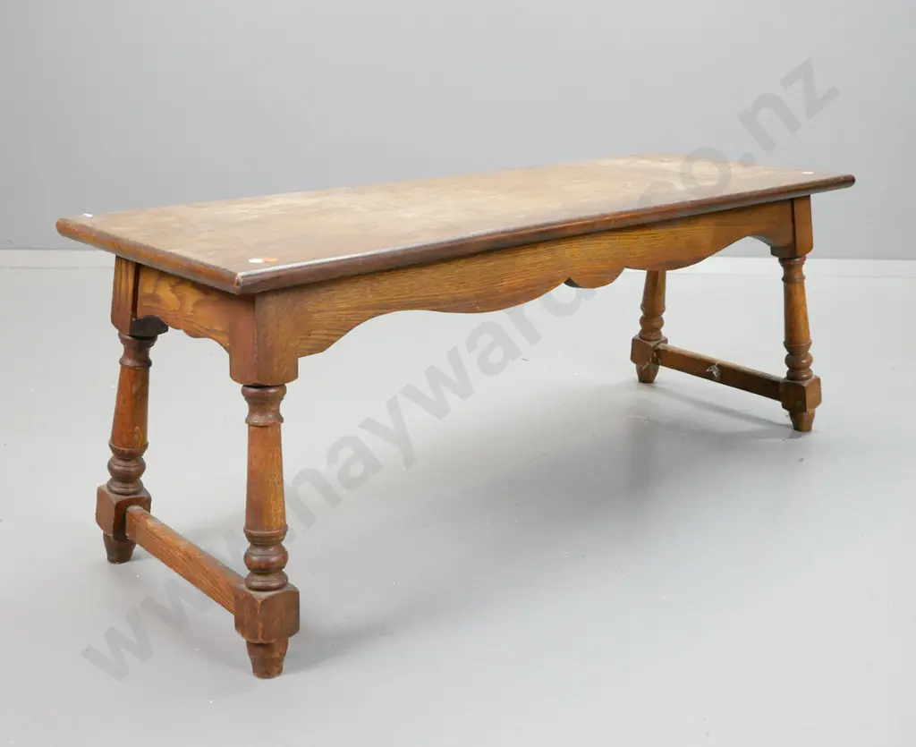 vintage oak coffee table with turned splayed legs, stretchers on ends, missing central stretcher on base, has polish Image 1++