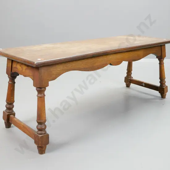 vintage oak coffee table with turned splayed legs, stretchers on ends, missing central stretcher on base, has polish