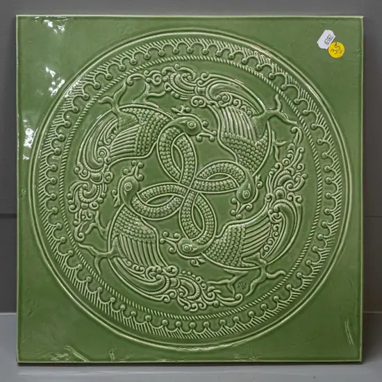 large green ceramic tile with intertwined mythical birds - Marcus Wainwright marks, dated 2008 on back 310x310