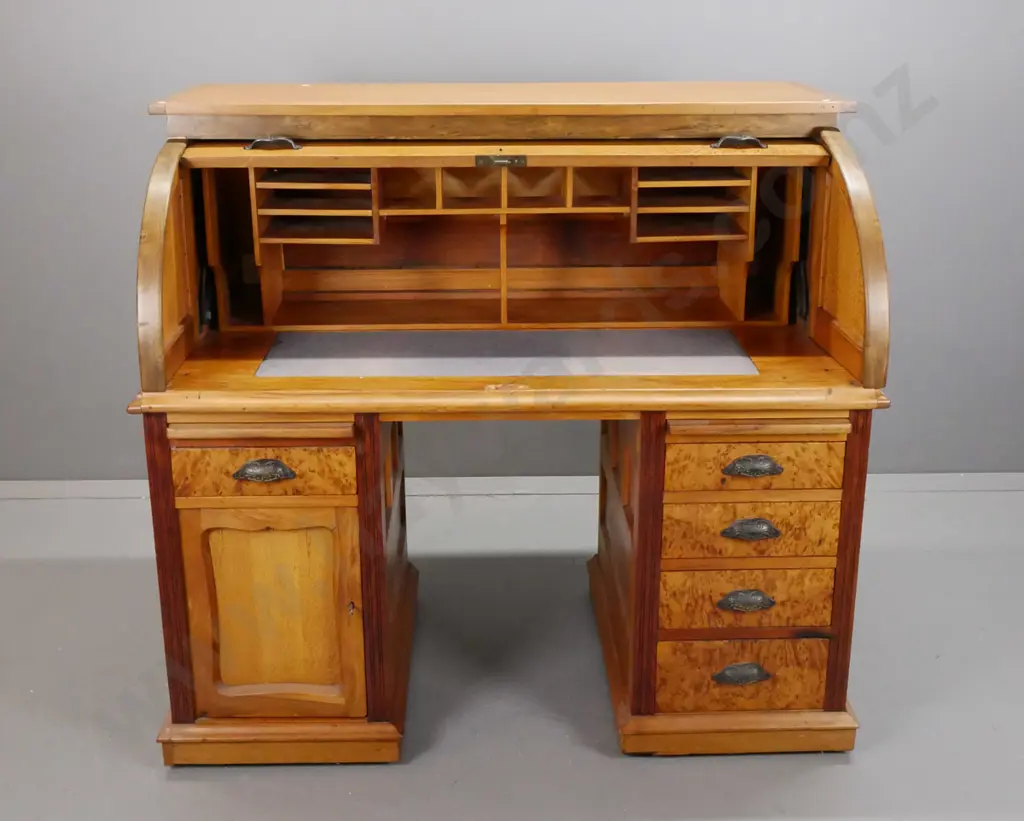 colonial rimu, rewa-rewa and mottled kauri double pedestal cylinder top desk with drawer front, hinged side panels, 5 Image 1++