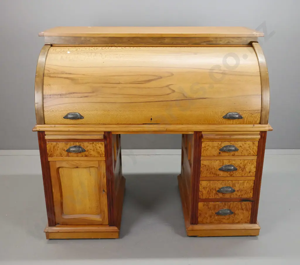 colonial rimu, rewa-rewa and mottled kauri double pedestal cylinder top desk with drawer front, hinged side panels, 5 Image 1++