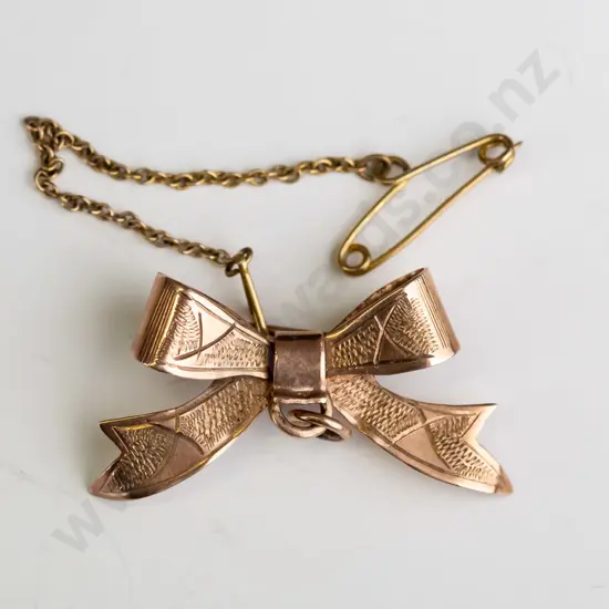 9ct bow brooch 2.9gms