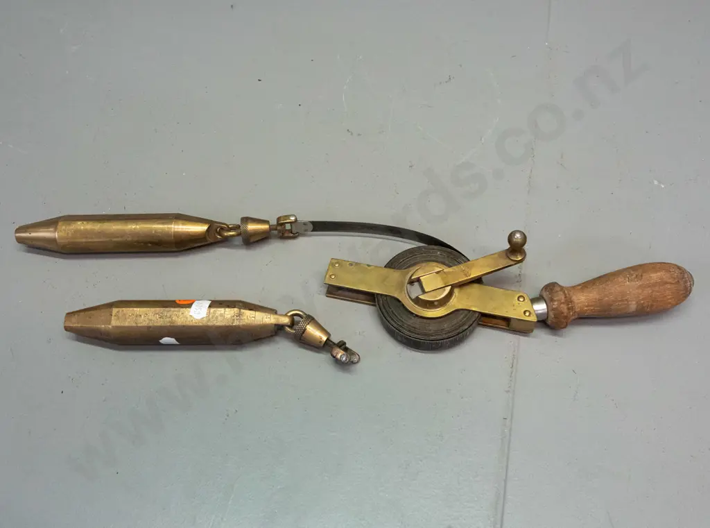 vintage Rabone Chesterman England measuring tape in inches with 2 plumb bobs, one marked with inches, one with metric - Image 1++