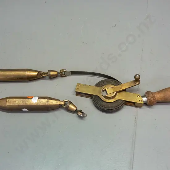 vintage Rabone Chesterman England measuring tape in inches with 2 plumb bobs, one marked with inches, one with metric -