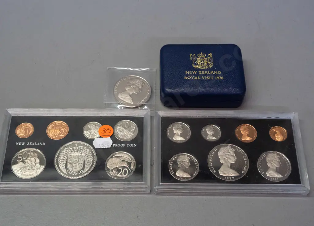 two plastic cased New Zealand 1972 proof coin sets and a NZ Royal Visit 1970 Cook Islands dollar Image 1++
