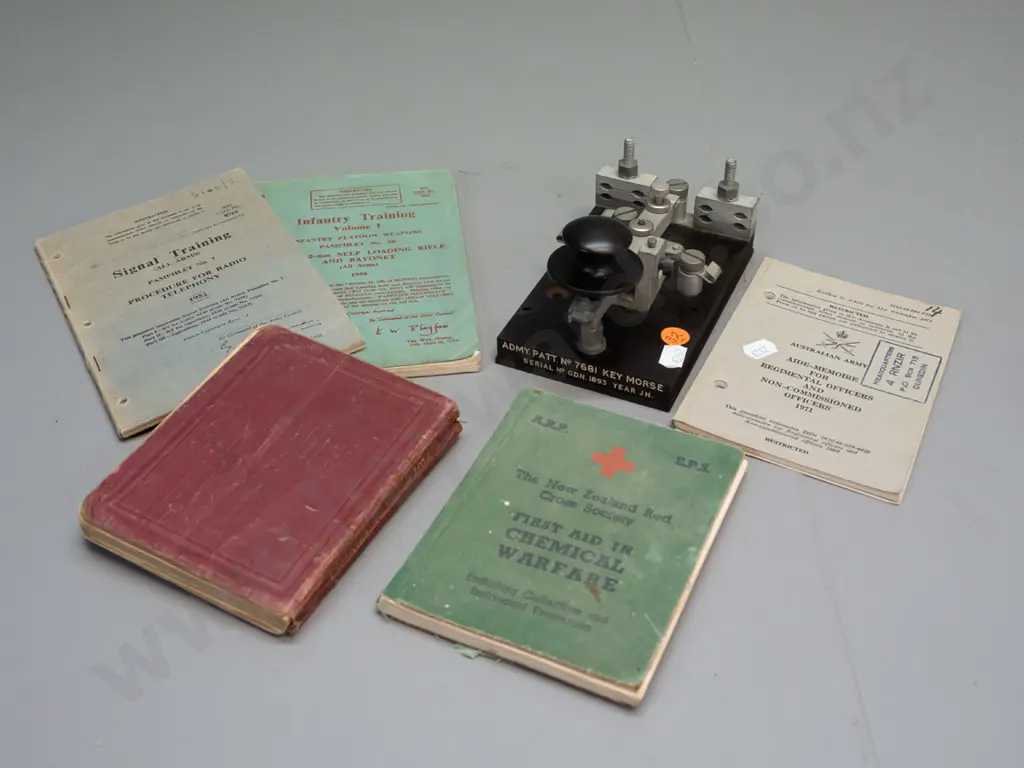 assorted military handbooks - signals training, first aid & chemical warfare, infantry training - and a morse key H-90 Image 1++