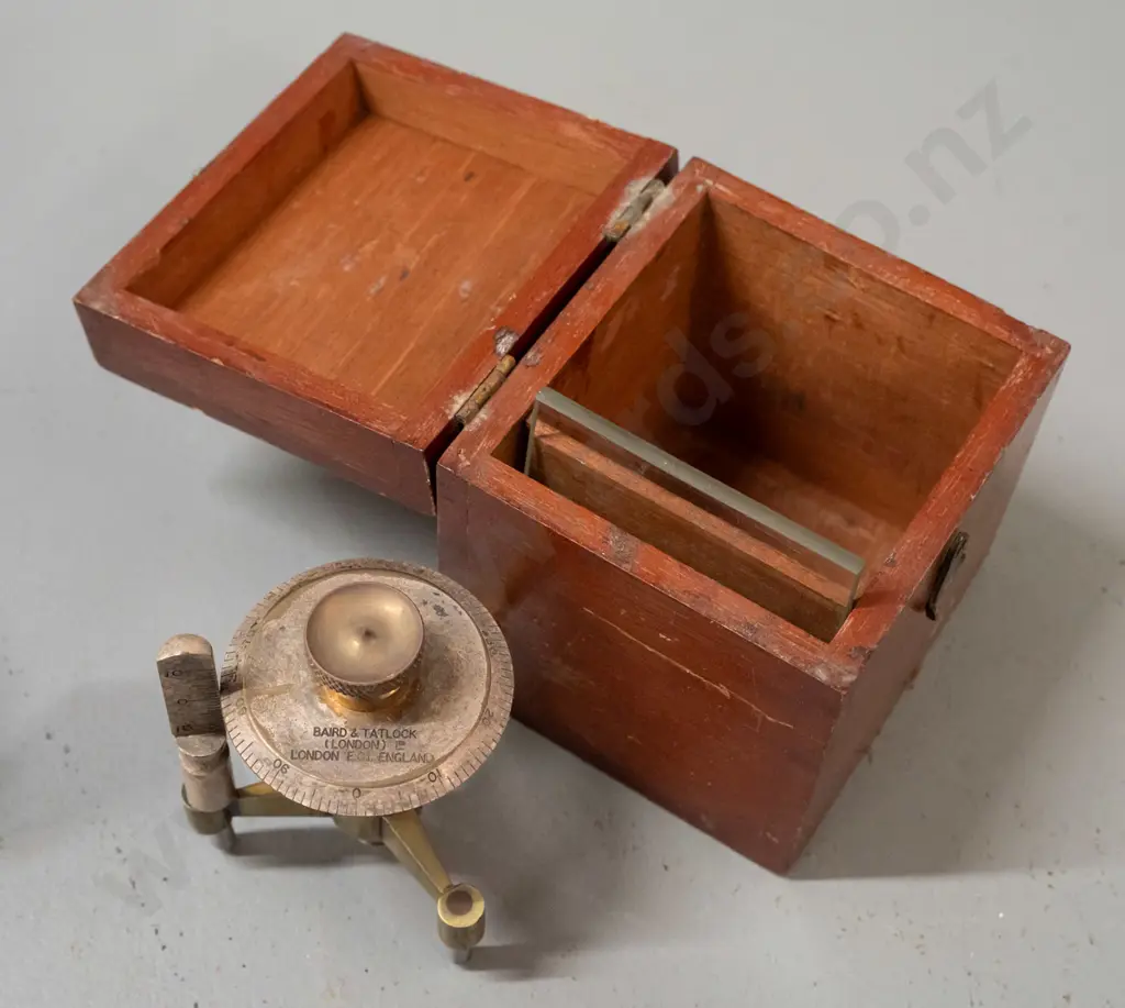 mahogany cased Baird & Tatlock spherometer and a RetroBrass Collectables reproduction sundial compass with leather case. Image 1++