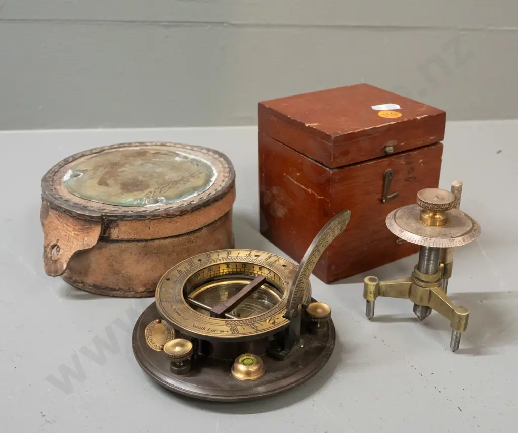 mahogany cased Baird & Tatlock spherometer and a RetroBrass Collectables reproduction sundial compass with leather case. Image 1++
