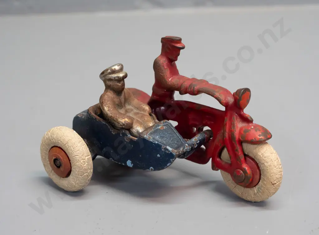 cast metal motorcycle with sidecar and loose rider figure, white tyres, mark underneath looks like "1245" - rubber tyres Image 1++