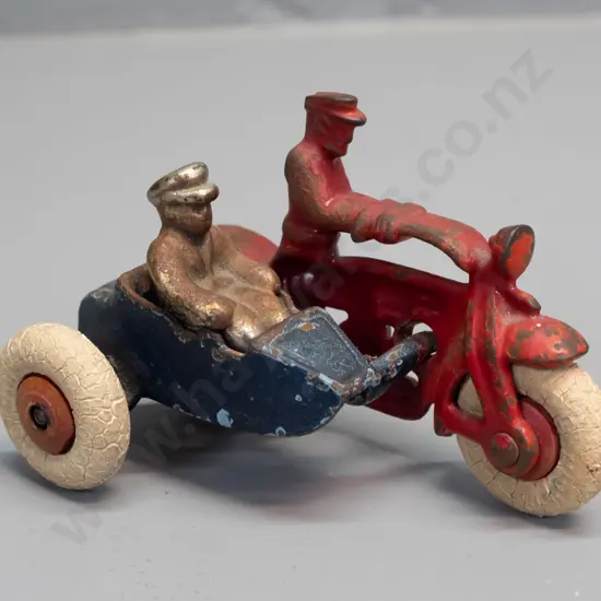 cast metal motorcycle with sidecar and loose rider figure, white tyres, mark underneath looks like "1245" - rubber tyres