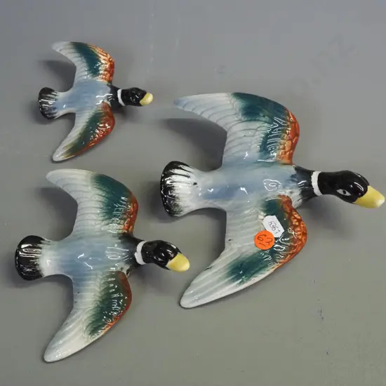 graduated set of 3 wall mount flying birds, no maker's marks - underside of wing tips have glaze loss. Largest L160 W170