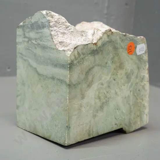 block of greenstone with 3 polished sides H-130 W-120 D-90