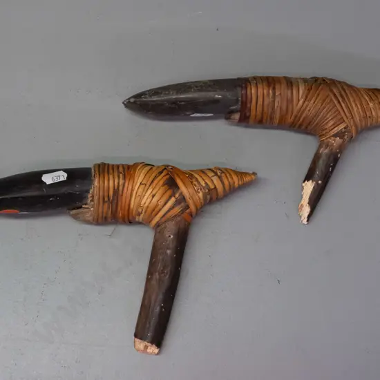 two stone adze heads with cane binding and remnant handles with borer holes - unknown origin (Pacific islands?) One has