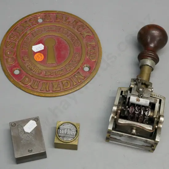 Vintage number stamp w/ turned hardwood handle, & associated items. Circular Brass and red painted plaque,