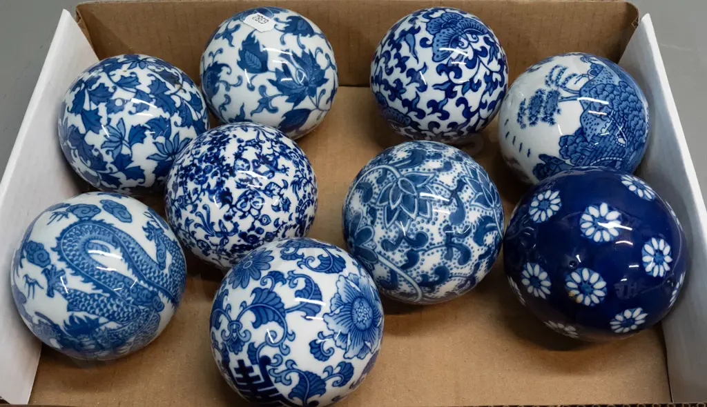 9 Chinese porcelain blue and white decorative balls - one w/dragon motifs, other insect, landscape or floral - D-80 Image 1++
