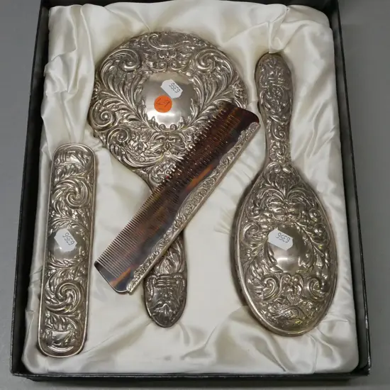 Boxed vanity set. Sterling silver embossed classical pattern, hand mirror, 2x brushes, comb.