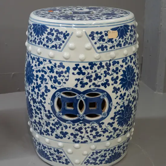Chinese blue and white ceramic garden seat with pierced cutouts in top and sides, raised stud pattern H-430 D-290 at top