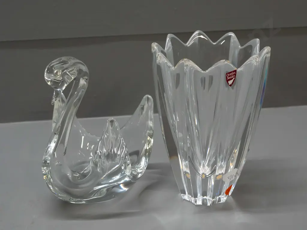 2 clear glass items - Orrefors Sweden fluted & petal shaped vase with label H-150, and a swan with no maker's marks Image 1++