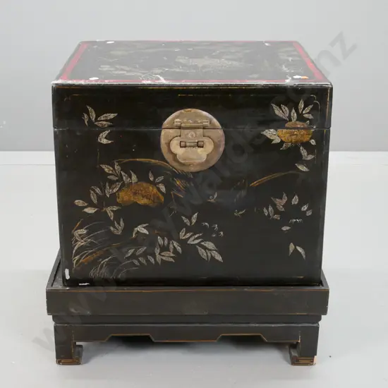 Chinese black lacquer chest on stand - gilded and silver decoration, hinged top section exposes paper-lined interior and