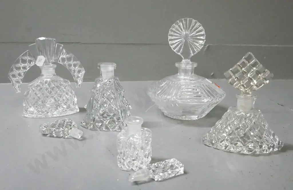 5x cut glass stoppered perfume bottles. 4x hobnail cut, smallest marked 'made in w germany', 2x damaged stoppers Image 1++