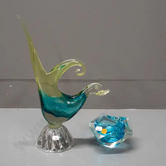 2 art glass items - blue and clear faceted ashtray w/ hobnail pattern on base & clear, blue & yellow bird figure H-330