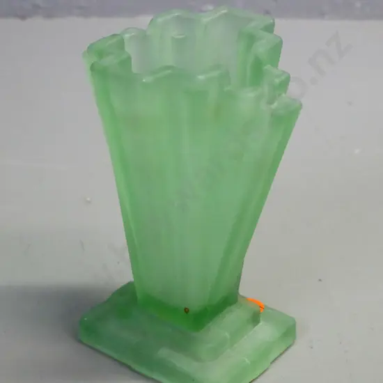 art deco moulded green uranium glass vase. Chip to corner of base. H-155