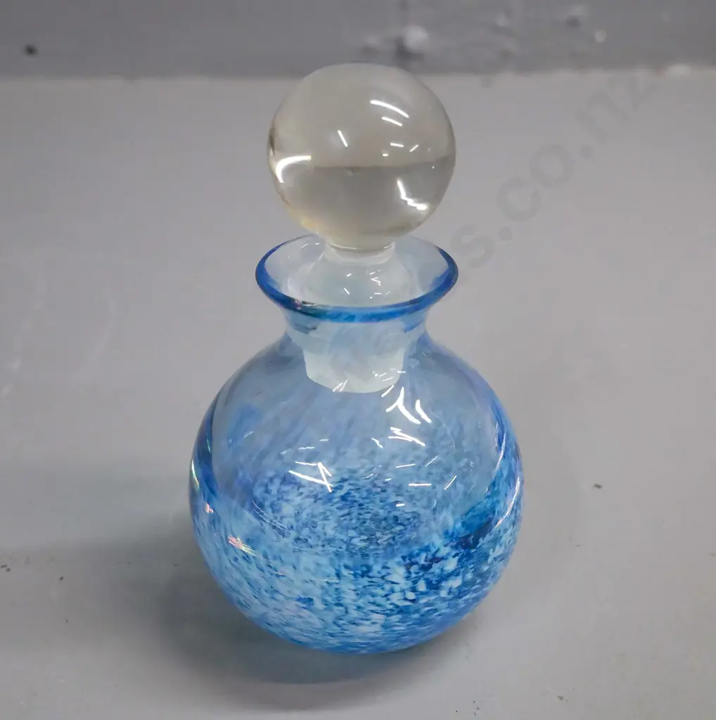 three pieces of art glass: oval bowl in brown and ivory, mottled blue scent bottle & clear fluted vase. Scent bottle Image 1++