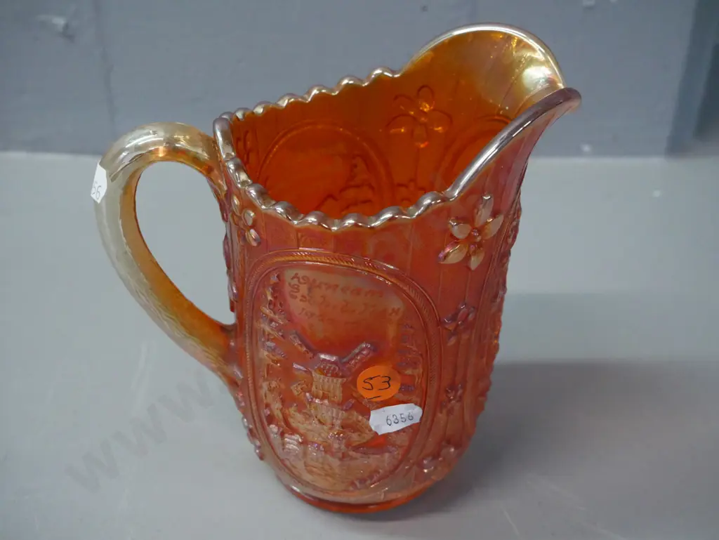carnival glass orange lustre jug with 'Dunedin Exhibition 1925-26' engraved. H-160 W-160 Image 1++