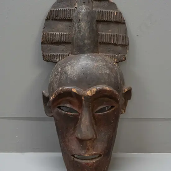 Ivory Coast Baule tribe carved and pigmented wooden wall mask - some cracks and wear H-470 W-230